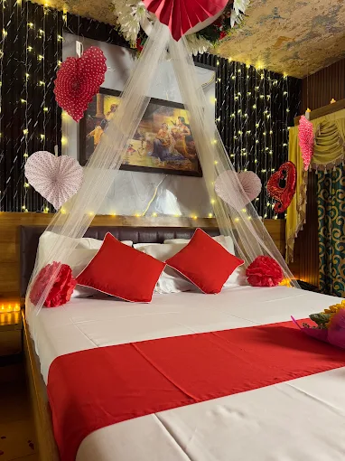 Romantic room decorated with hearts and warm lights